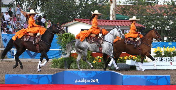 Women riding side saddle leading individual medal winners at the Pan American Games. © 2011 Ken Braddick/dressage-news.com