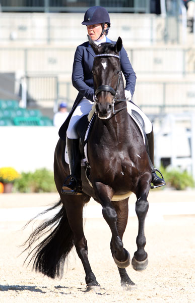 Kimberly Herslow and Rosmarin on their way to victory in the Intermediate 1. © 2013 Ken Braddick/dressage-news.com