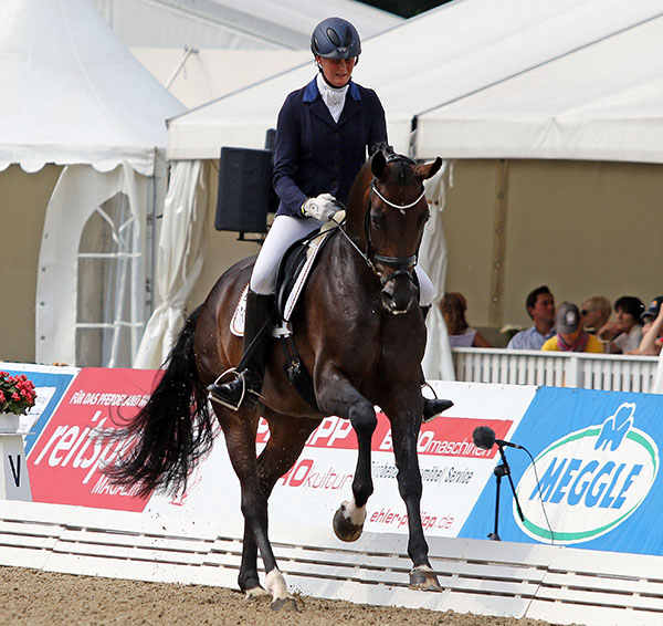 Claudia Rüscher and Florina had to compete in two qualifiers to make it to the World Young Horse five-year-old Championship but in their third competition in three days placed fourth. © 2015 Ken Braddick/dressage-news.com